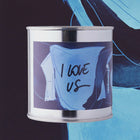 "I love us" soy wax candle in a metal can