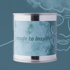 "Made to inspire" soy wax candle in a metal can