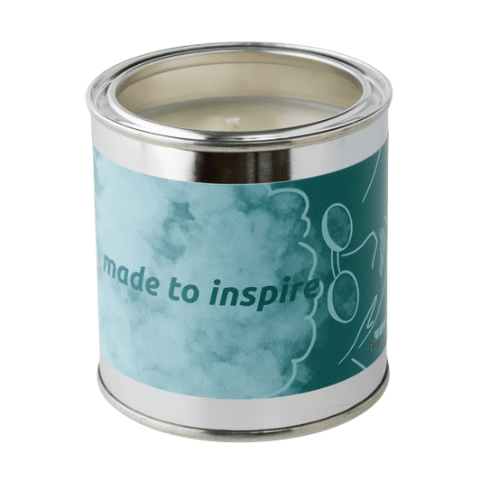 "Made to inspire" soy wax candle in a metal can