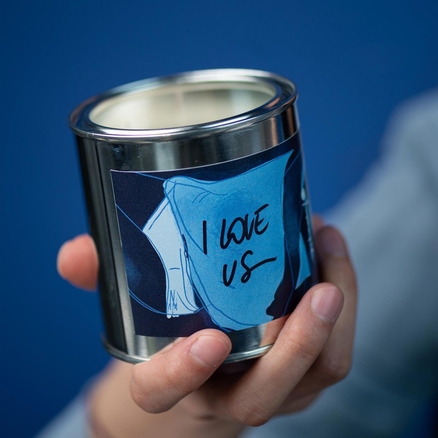 "I love us" soy wax candle in a metal can